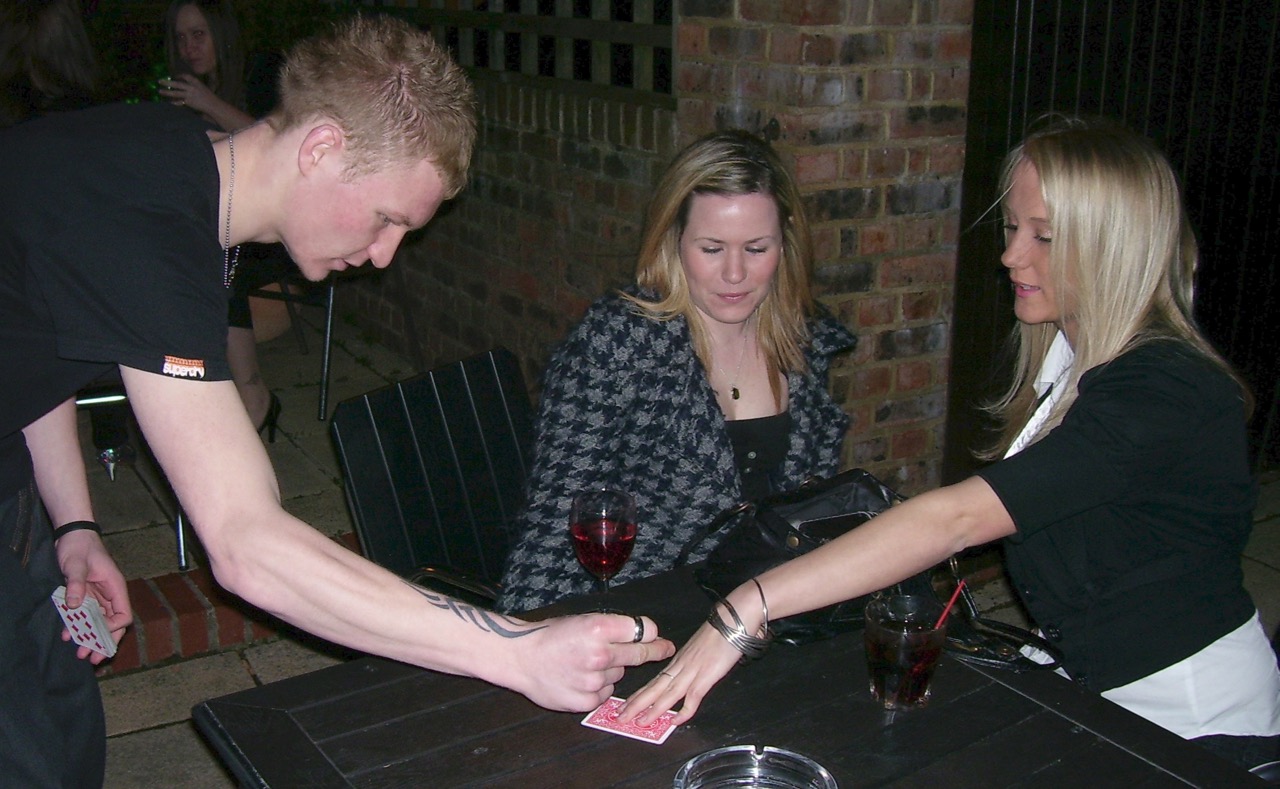 Street Magician Liam Walsh performing close up magic for Big Brother 8 Ziggy, Liam and Brian in Worthing at Liquid Lounge